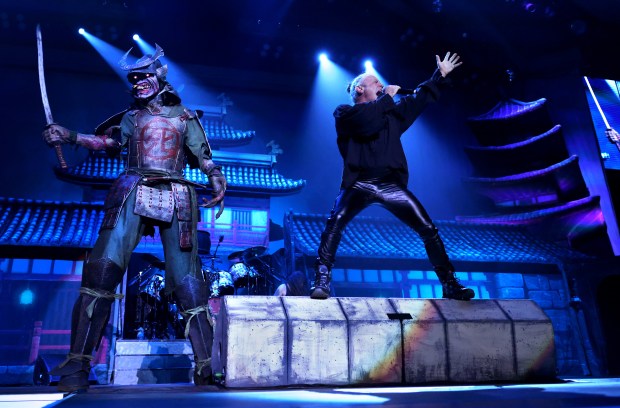 Lead vocalist Bruce Dickinson leads Iron Maiden at the United Center in Chicago on Oct. 5, 2022. (Chris Sweda/Chicago Tribune)