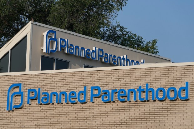 A Planned Parenthood sign is displayed on the outside of the clinic, Aug. 1, 2023, in Indianapolis. (AP Photo/Darron Cummings, File)