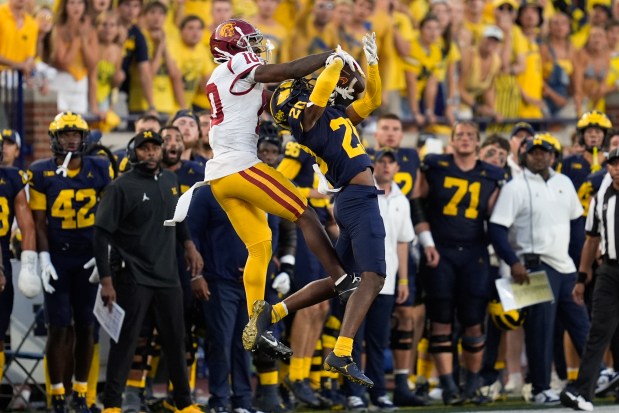 Michigan defensive back Jyaire Hill breaks up a pass intended for USC wide receiver Kyron Hudson in the second half on Sept. 21, 2024. (AP Photo/Paul Sancya)