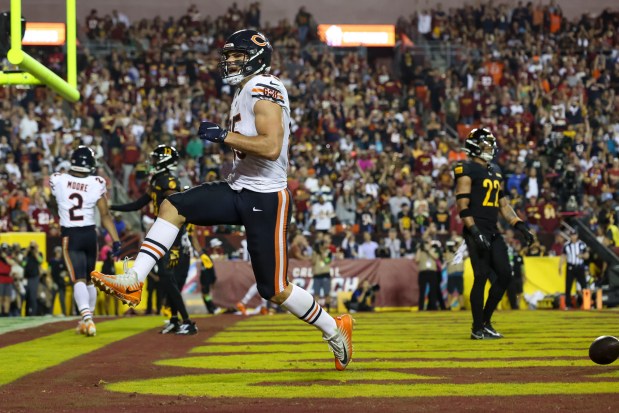 Bears tight end Cole Kmet celebrates his touchdown in the second quarter on Oct. 5, 2023, at FedEx Field. (Brian Cassella/Chicago Tribune)