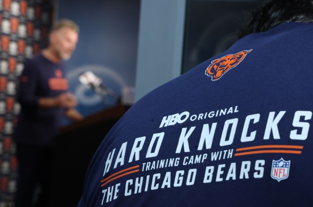 The crew of HBO's "Hard Knocks" records Bears coach Matt Eberflus speaking with the media during training camp at Halas Hall on July 22, 2024. (Stacey Wescott/Chicago Tribune)