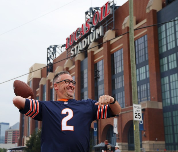 Eric Lucas plays catch before the start of the Bears game outside of Lucas Oil Stadium on Sept. 22, 2024, in Indianapolis. (Stacey Wescott/Chicago Tribune)