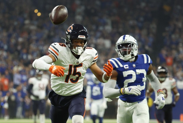 Chicago Bears quarterback Caleb Williams (18) pass to an open Rome Odunze (15) during the first quarter of the Chicago Bears and Indianapolis Colts game at Lucas Oil Stadium on Sept. 22, 2024, in Indianapolis. (Stacey Wescott/Chicago Tribune)