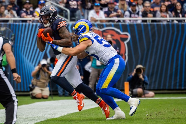 Bears wide receiver DJ Moore secures a 9-yard touchdown reception during the third quarter against the Rams on Sept. 29, 2024, at Soldier Field. The Bears won 24-18. (Tess Crowley/Chicago Tribune)