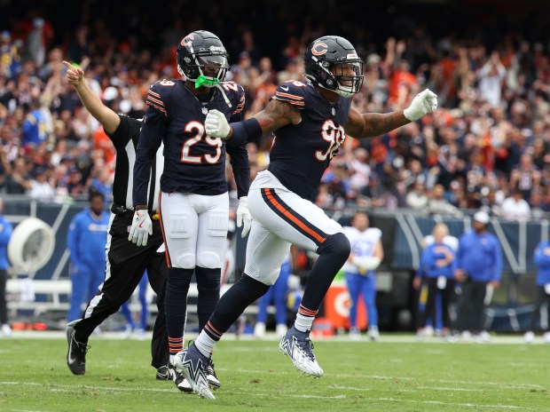 Bears defensive end Montez Sweat (98) celebrates his forced fumble on Rams quarterback Matt Stafford that the Bears recovered in the second quarter on Sept. 29, 2024, at Soldier Field. (Brian Cassella/Chicago Tribune)