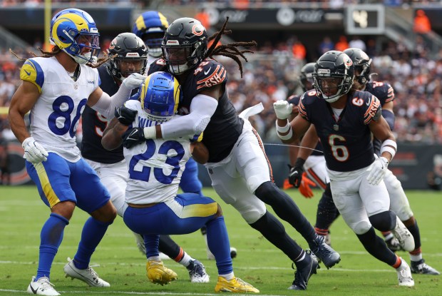 Bears linebacker Tremaine Edmunds (49) tackles Rams running back Kyren Williams (23) for a loss in the fourth quarter on Sept. 29, 2024. (Brian Cassella/Chicago Tribune)