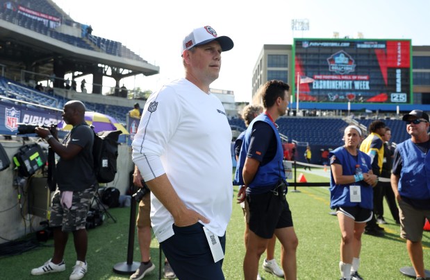 Bears offensive coordinator Shane Waldron walks onto the field before the Hall of Fame Game against the Texans at Tom Benson Hall of Fame Stadium on Aug. 1, 2024, in Canton. (John J. Kim/Chicago Tribune)