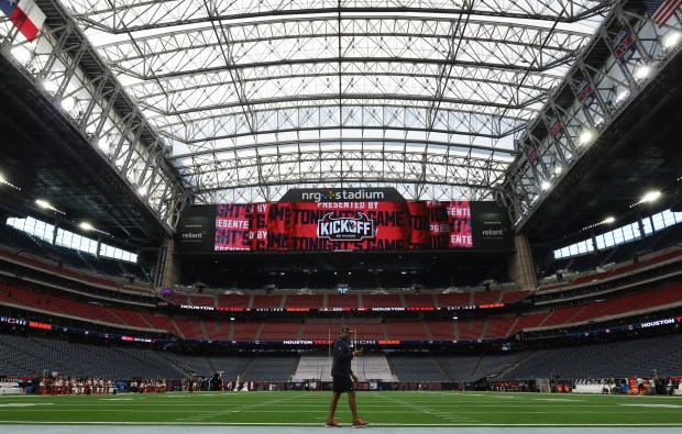 Bears general manager Ryan Poles walks the perimeter of the field before a game against the Texans at NRG Stadium on Sept. 15, 2024, in Houston. (John J. Kim/Chicago Tribune)