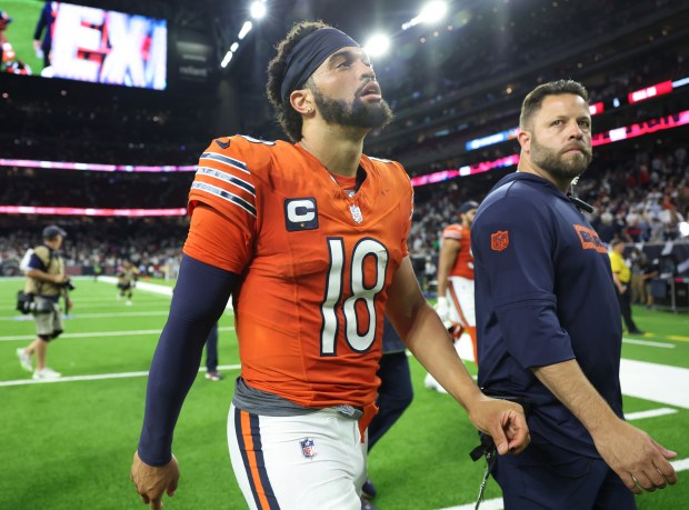 Bears quarterback Caleb Williams (18) heads for the locker room after a 19-13 loss to the Texans at NRG Stadium on Sept. 15, 2024, in Houston. (John J. Kim/Chicago Tribune)