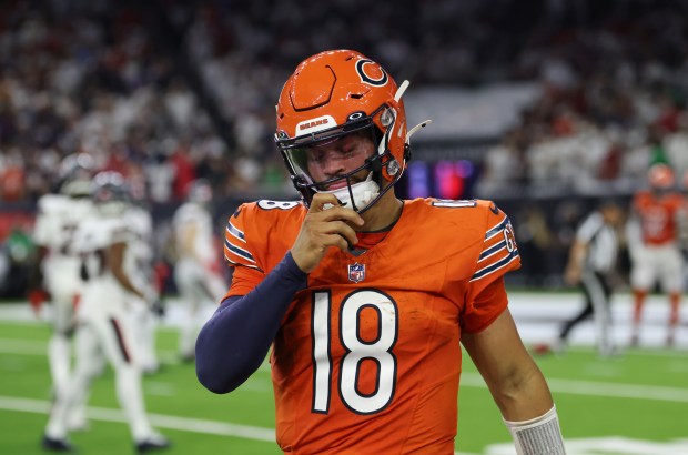 Bears quarterback Caleb Williams heads to the sideline after getting sacked in the fourth quarter against the Texans at NRG Stadium on Sept. 15, 2024, in Houston. (John J. Kim/Chicago Tribune)