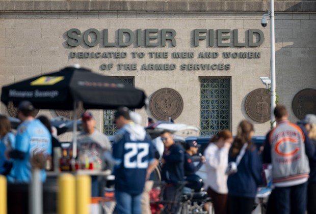 Chicago Bears and Tennessee Titans fans tailgate in the Waldron Deck before the season opener on Sunday, Sept. 8, 2024, at Soldier Field. (Brian Cassella/Chicago Tribune)