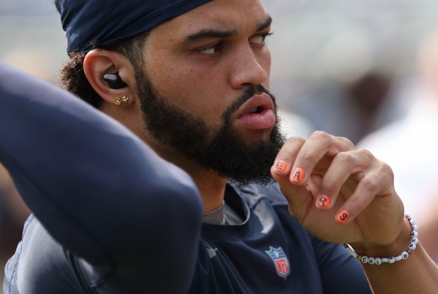 Chicago Bears quarterback Caleb Williams, 18, warms up to face the Tennessee Titans on Sunday, Sept. 8, 2024, at Soldier Field. (Brian Cassella/Chicago Tribune)