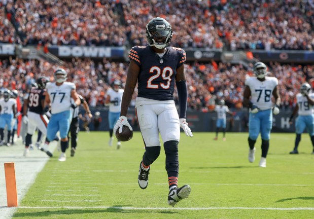 Bears cornerback Tyrique Stevenson scores on an interception return against the Titans in the fourth quarter on Sept. 8, 2024, at Soldier Field.(Brian Cassella/Chicago Tribune)