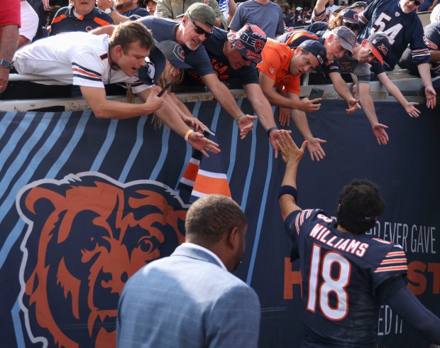 Chicago Bears quarterback Caleb Williams celebrates his first career win Sunday, Sept. 8, 2024, at Soldier Field. The Bears defeated the Titans 24-17. (Brian Cassella/Chicago Tribune)