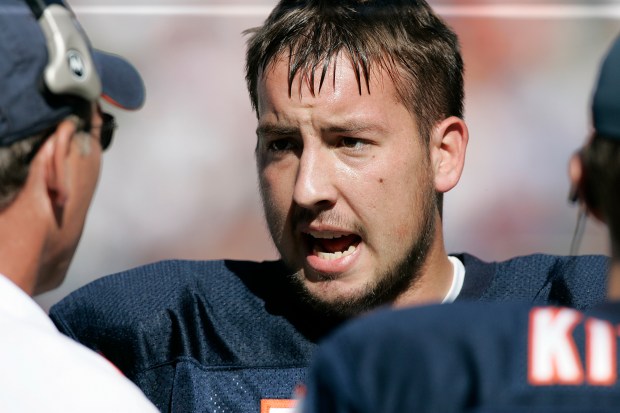 Bears quarterback Kyle Orton talks to coaches on the sideline during a 28-3 victory over the Vikings on Oct. 16, 2005, at Soldier Field. (Jim Prisching/Chicago Tribune)