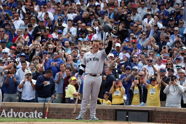 Yankees first baseman Anthony Rizzo (48) salutes the crowd before batting against the Cubs in the second inning at Wrigley Field on Sept. 6, 2024. (Terrence Antonio James/Chicago Tribune)