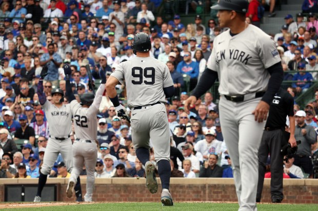 Yankees outfielder Aaron Judge (99) scores in the third inning against the Cubs at Wrigley Field on Sept. 6, 2024. (Terrence Antonio James/Chicago Tribune)