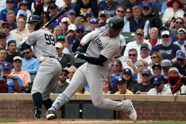 Yankees outfielder Juan Soto (22) hits a single in the third inning against the Cubs at Wrigley Field on Sept. 6, 2024. (Terrence Antonio James/Chicago Tribune)