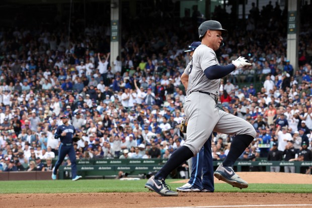 Yankees outfielder Aaron Judge (99) rounds third base on his way home in the third inning against the Cubs at Wrigley Field on Sept. 6, 2024. (Terrence Antonio James/Chicago Tribune)