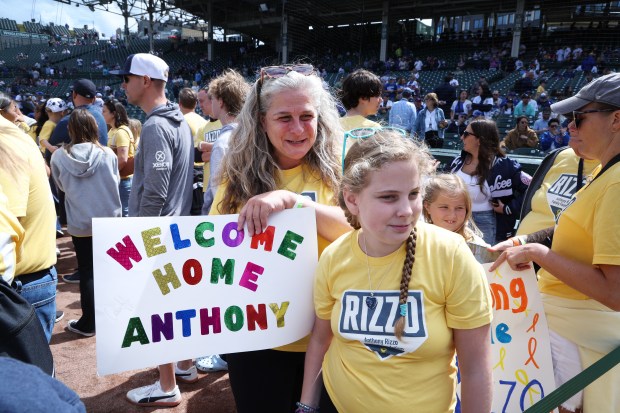 Sarah Zematis, left, and her daughter Sophia, age 12, attend a game between the Yankees and the Cubs at Wrigley Field courtesy of the Anthony Rizzo Family Foundation on Sept. 6, 2024. (Terrence Antonio James/Chicago Tribune)