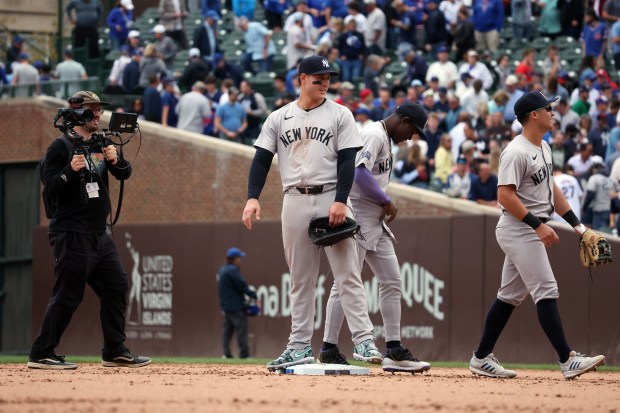 Yankees first baseman Anthony Rizzo stands on the field after the Yankees beat the Cubs 3-0 on Sept. 6, 2024, at Wrigley Field. (Terrence Antonio James/Chicago Tribune)