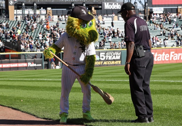 White Sox mascot Southpaw makes a sweeping gesture with a broom after the team beat the Angels 7-0 at Guaranteed Rate Field on Sept. 26, 2024, in Chicago. The White Sox swept the series 3-0. (John J. Kim/Chicago Tribune)