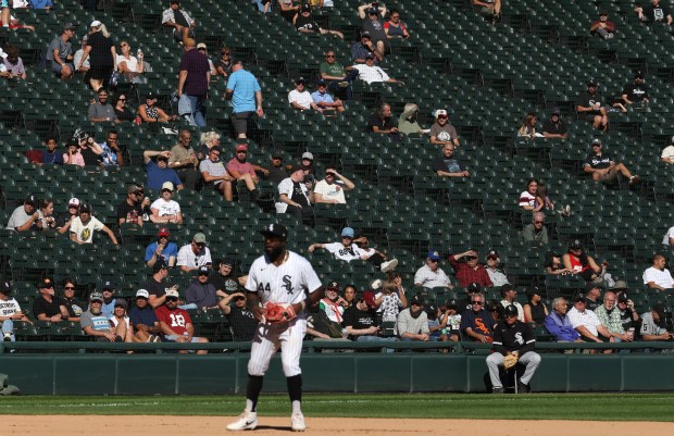 White Sox third baseman Bryan Ramos gets into his fielding stance as fans watch the eighth inning against the Angels in a lightly attended final home game of the season at Guaranteed Rate Field on Sept. 26, 2024. (John J. Kim/Chicago Tribune)