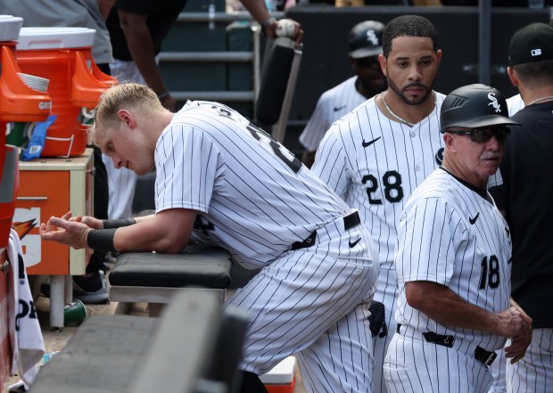 White Sox first baseman Andrew Vaughn leans on a bench in the dugout after a loss to the Astros on June 20, 2024, at Guaranteed Rate Field. (John J. Kim/Chicago Tribune)