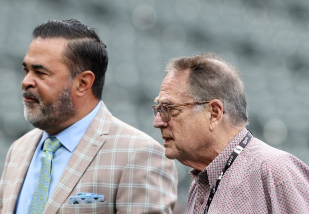 Ozzie Guillen, left, and White Sox Chairman Jerry Reinsdorf talk before a game against the Cubs on Aug. 9, 2024, at Guaranteed Rate. (John J. Kim/Chicago Tribune)