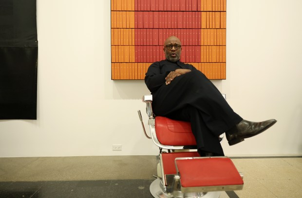 Artist and educator Theaster Gates talks about his exhibition, "When Clouds Roll Away: Reflection and Restoration from the Johnson Archive," at the Stony Island Arts Bank. (John J. Kim/Chicago Tribune)