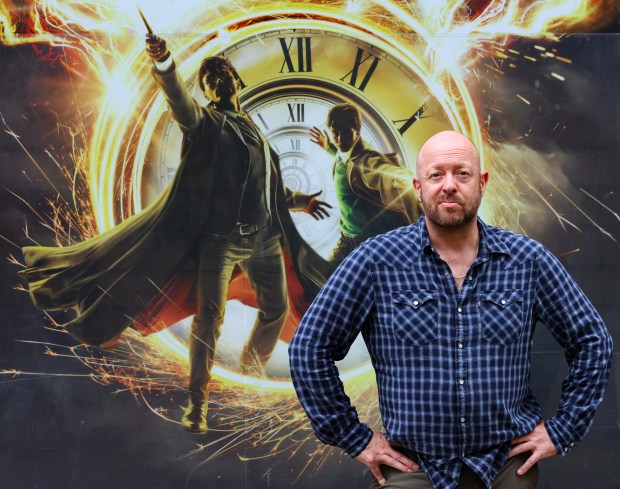 Director John Tiffany outside the Nederlander Theatre, Aug. 27, 2024, in Chicago. Tiffany directs the upcoming stage production of "Harry Potter and the Cursed Child." (John J. Kim/Chicago Tribune)