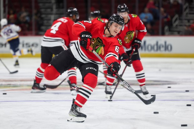 Blackhawks left wing Samuel Savoie warms up before a preseason game against the Blues on Sept. 27, 2022, at the United Center. (Armando L. Sanchez/Chicago Tribune)