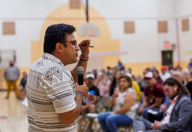 Ald. Byron Sigcho-Lopez's, 25th, speaks with members of the community during a listening session for a proposed tax increment financing expansion at Irma C. Ruiz Elementary School on Sept. 9, 2024, in Chicago. (Armando L. Sanchez/Chicago Tribune)