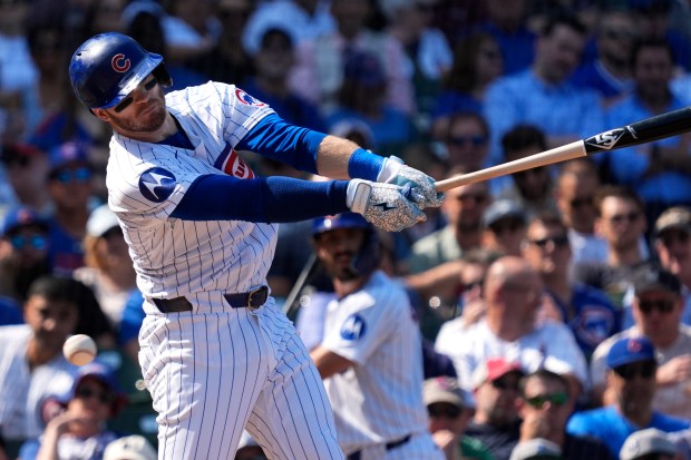 The Cubs' Ian Happ strikes out swinging during the third inning Wednesday, Sept. 18, 2024, at Wrigley Field. (AP Photo/Nam Y. Huh)