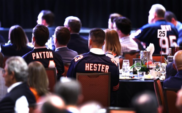 People wear Chicago Bears jerseys while listening in to Chicago Bears President and CEO Kevin Warren being interviewed by Conagra Brands President and CEO Sean Connolly during an Economic Club of Chicago on Sept. 5, 2024. (Chris Sweda/Chicago Tribune)