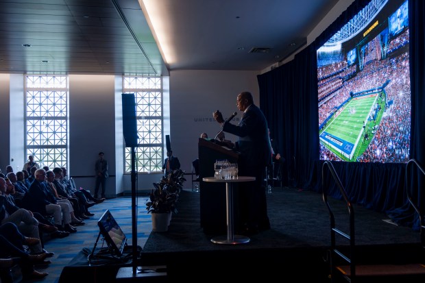 Team president and CEO Kevin Warren presents renderings as the Bears announce their plans to build a new domed lakefront stadium on April 24, 2024, at Soldier Field. (Brian Cassella/Chicago Tribune)