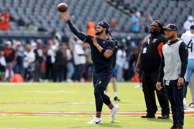 Chicago Bears quarterback Caleb Williams, 18, warms up for the season opener against the Tennessee Titans at Soldier Field in Chicago on Sept. 8, 2024. (Chris Sweda/Chicago Tribune)