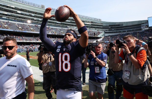 Chicago Bears quarterback Caleb Williams celebrates while coming off the field after a victory over the Tennessee Titans at Soldier Field in Chicago on Sept. 8, 2024. (Chris Sweda/Chicago Tribune)