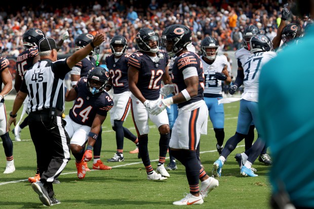 Velus Jones Jr. reacts as a referee signals that the Titans have possession of the ball after Jones Jr. fumbled a kickoff in the first quarter at Soldier Field on Sept. 8, 2024. (Chris Sweda/Chicago Tribune)