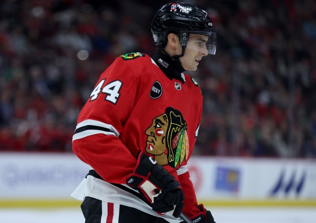 Chicago Blackhawks defenseman Wyatt Kaiser (44) wears a neck guard while on the ice in the first period of a game against the Florida Panthers at the United Center in Chicago on Saturday, Nov. 4, 2023. (Chris Sweda/Chicago Tribune)