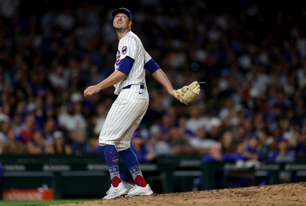 Chicago Cubs relief pitcher Drew Smyly watches the flight of a ball that went for a 3-run home run for Washington Nationals right fielder Joey Gallo in the sixth inning of a game at Wrigley Field in Chicago on Sept. 19, 2024. (Chris Sweda/Chicago Tribune)