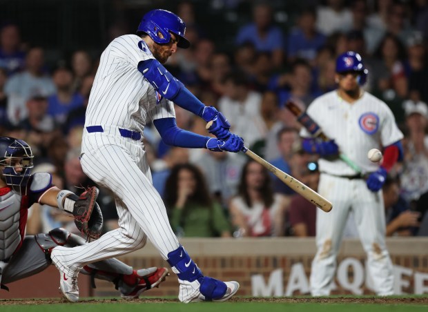 Chicago Cubs right fielder Cody Bellinger drives in a run on a single in the seventh inning of a game against the Washington Nationals at Wrigley Field in Chicago on Sept. 19, 2024. (Chris Sweda/Chicago Tribune)