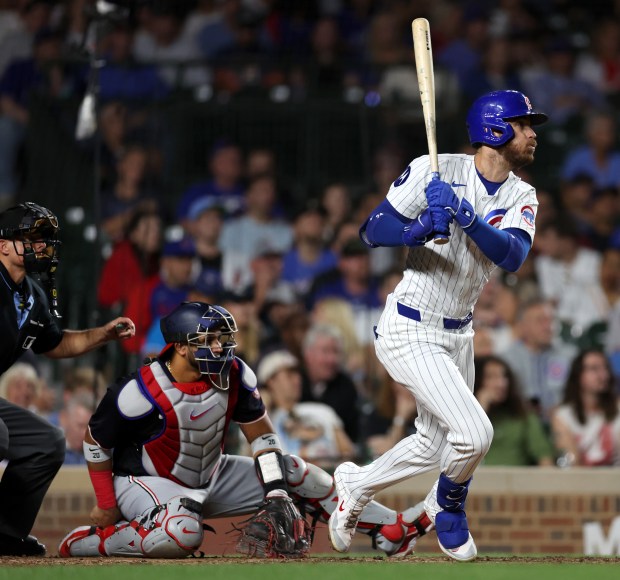 Chicago Cubs right fielder Cody Bellinger drives in a run on a single in the seventh inning of a game against the Washington Nationals at Wrigley Field in Chicago on Sept. 19, 2024. (Chris Sweda/Chicago Tribune)