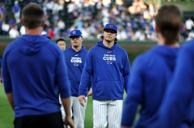 Chicago Cubs pitcher Justin Steele walks in from the bullpen alongside other pitchers before a start by teammate and fellow pitcher Kyle Hendricks against the Pittsburgh Pirates at Wrigley Field in Chicago on Sept. 3, 2024. (Chris Sweda/Chicago Tribune)