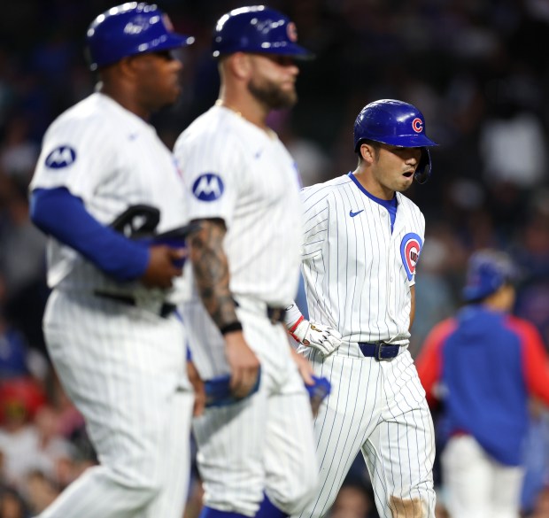 Chicago Cubs designated hitter Seiya Suzuki (27) walks to the dugout after groaning out to end the second inning of a game against the Pittsburgh Pirates at Wrigley Field in Chicago on Sept. 3, 2024. (Chris Sweda/Chicago Tribune)