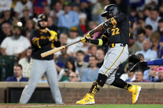 Pittsburgh Pirates designated hitter Andrew McCutchen (22) drives in a run on a sacrifice fly in the third inning of a game against the Chicago Cubs at Wrigley Field in Chicago on Sept. 3, 2024. (Chris Sweda/Chicago Tribune)