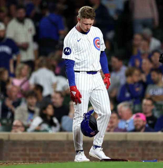 Chicago Cubs center fielder Pete Crow-Armstrong (52) drops his helmet to the ground after striking out to end the sixth inning of a game against the Pittsburgh Pirates at Wrigley Field in Chicago on Sept. 3, 2024. (Chris Sweda/Chicago Tribune)