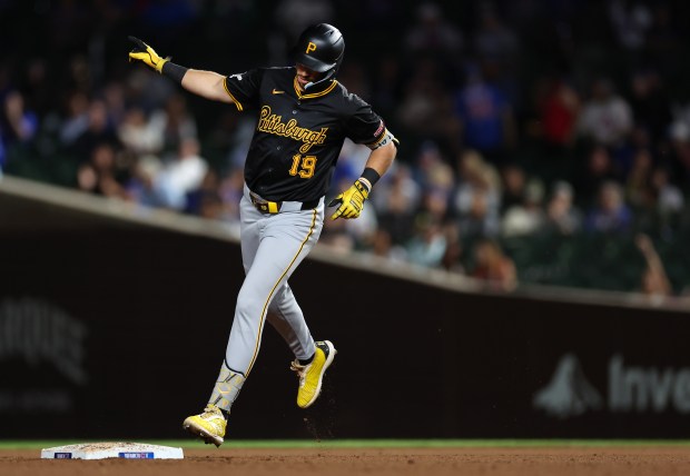 Pittsburgh Pirates third baseman Jared Triolo rounds the bases after hitting a 3-run home run off of Chicago Cubs relief pitcher Tyson Miller in the seventh inning of a game at Wrigley Field in Chicago on Sept. 3, 2024. (Chris Sweda/Chicago Tribune)