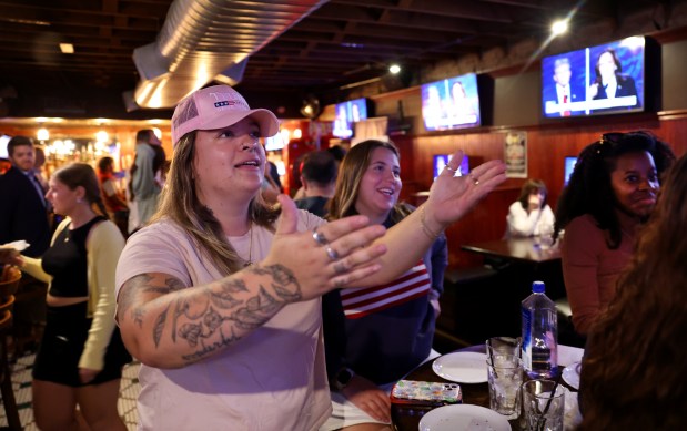 Samantha Schwartz reacts while attending a watch party hosted by Chicago Young Republicans at McGee's Tavern in Chicago's Lincoln Park neighborhood during a presidential debate between Donald Trump and Kamala Harris on Tuesday, Sept. 10, 2024. (Chris Sweda/Chicago Tribune)