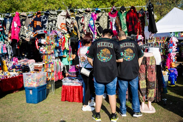 People shop at vendors at El Grito Chicago, a two-day festival in celebration of Mexican Independence Day, at Grant Park's Butler Field in Chicago on Sept. 14, 2024. (Tess Crowley/Chicago Tribune)